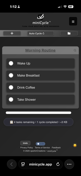 miniCycle default theme with dark mode enabled. The interface shows dark gray backgrounds with white text and lighter gray task cards. The sun icon in the lower right corner indicates dark mode is active - tap it to switch back to light mode.