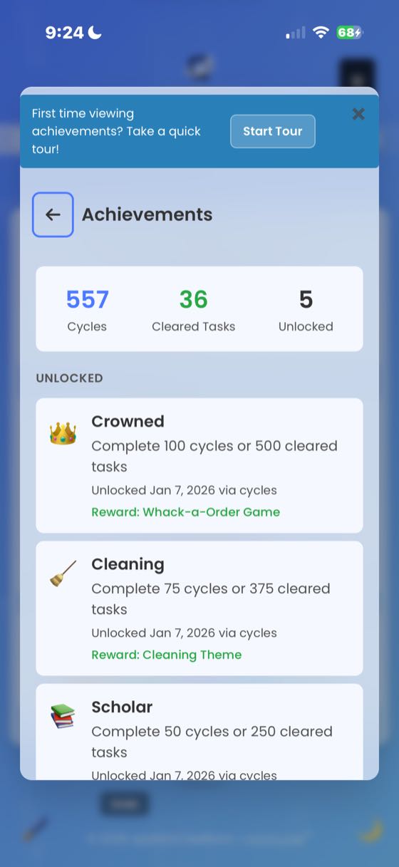 The Achievements page showing summary counters: 557 Cycles, 36 Cleared Tasks, 5 Unlocked. The Crowned achievement listed first with its Whack-a-Order Game reward, followed by Cleaning and Scholar.