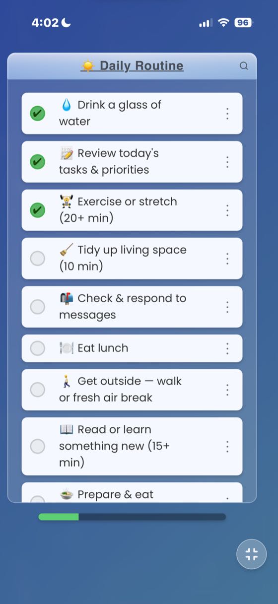 Focus Mode activated showing a simplified task list with no header, footer, or navigation chrome. Four of five tasks completed, with the compress button visible in the bottom-right corner.